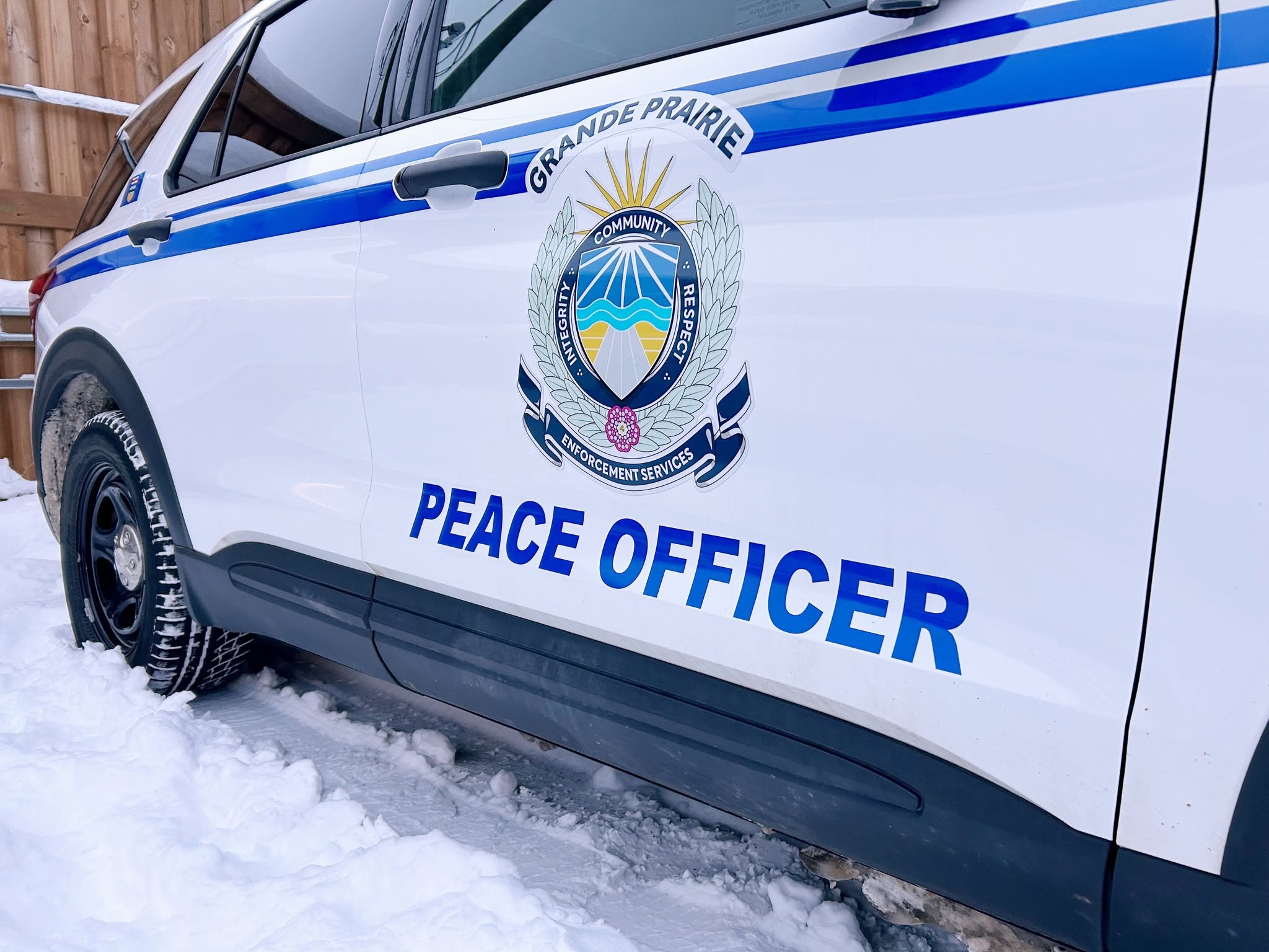 A Grande Prairie Enforcement Services vehicle in the snow